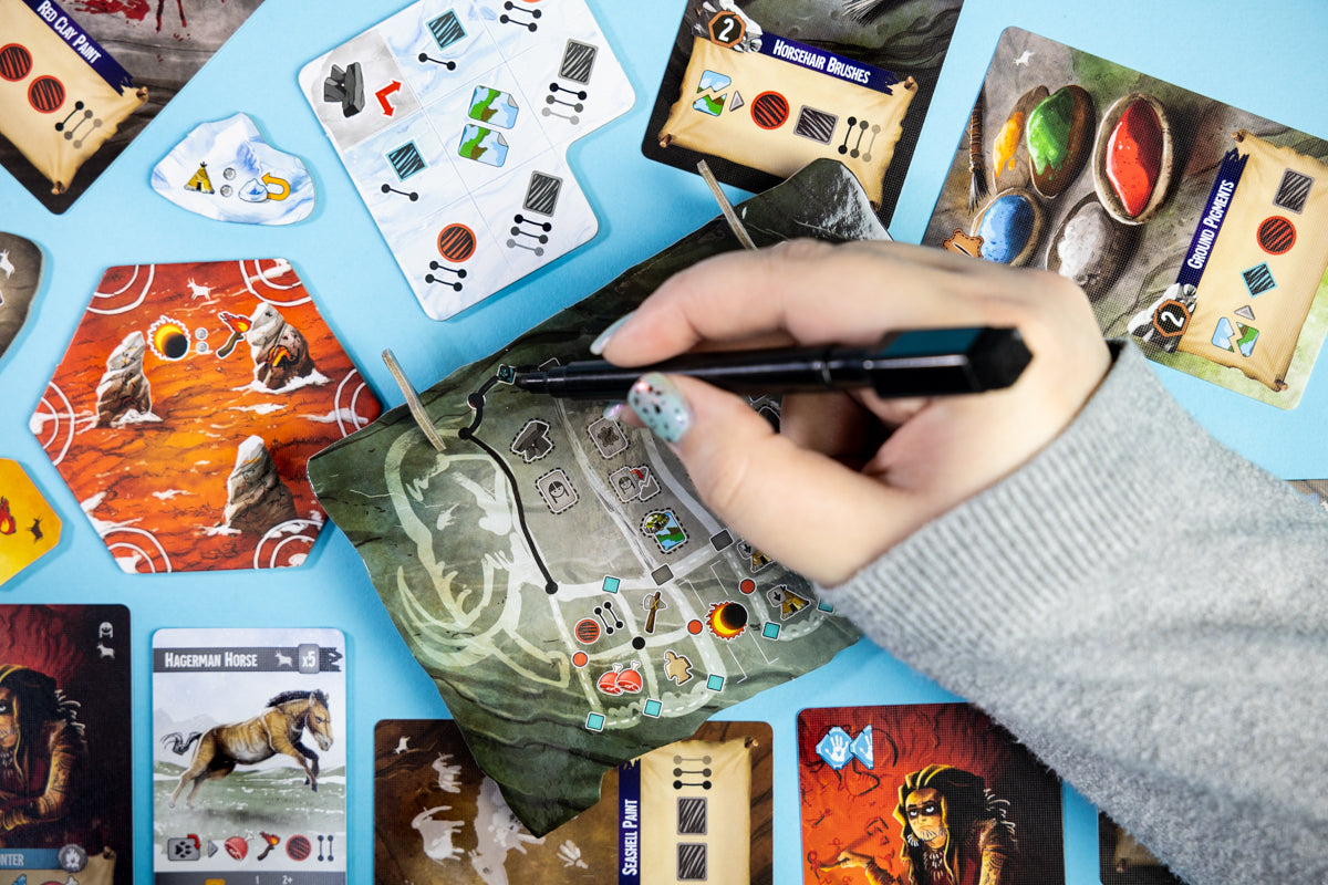 Endless Winter: Cave Paintings – officiële gameplayfoto van het grottekentekenbord en onderdelen