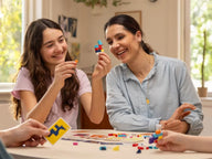 Players enjoying LEGO Brick Like This around a table