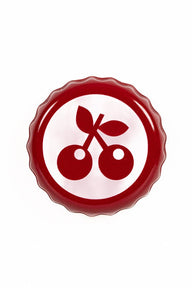 Close-up van één Fallout Nuka Cherry bottle cap