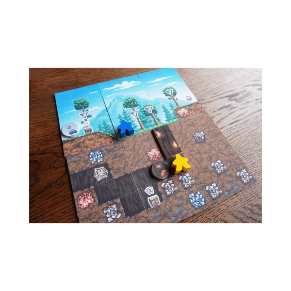 Spelsituatie van Terraria: The Board Game met opgebouwde wereldtegels en spelersfiguren
